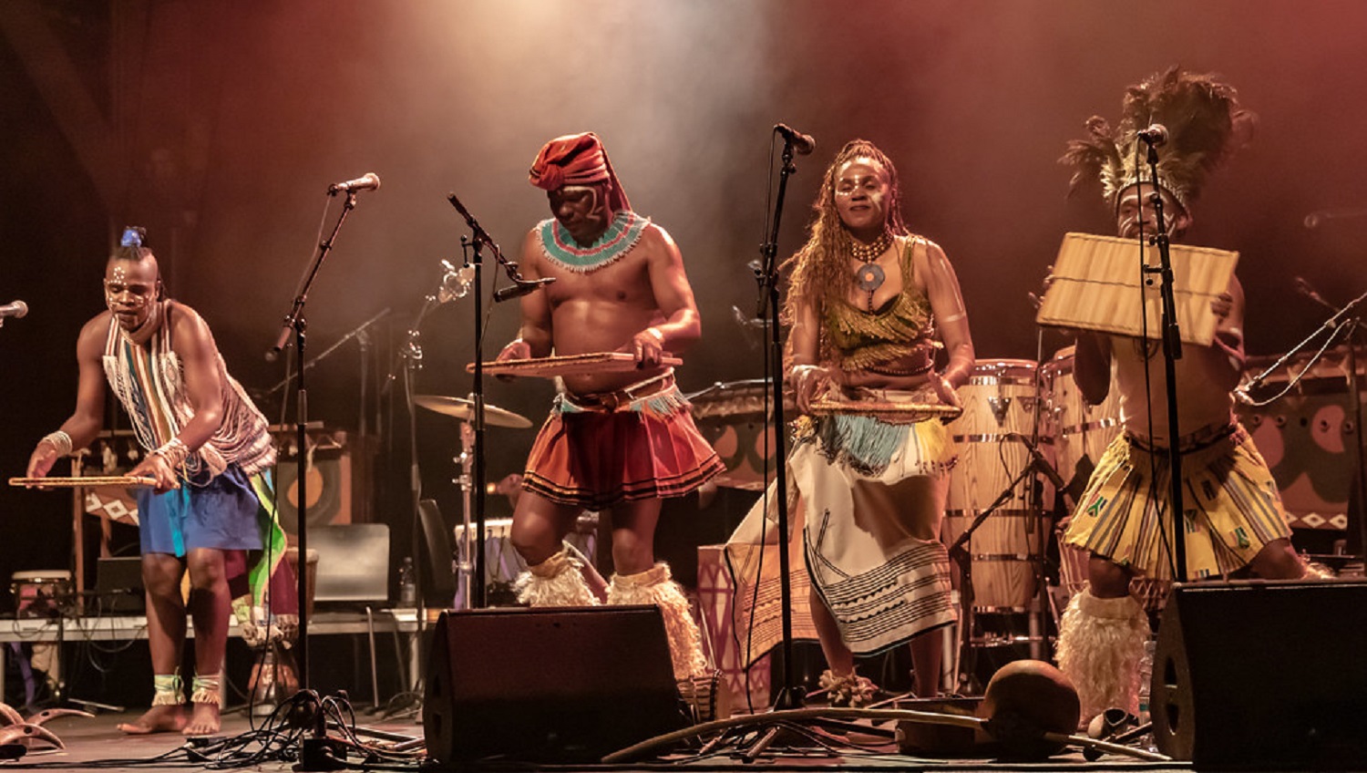 A traditional African band performing on stage